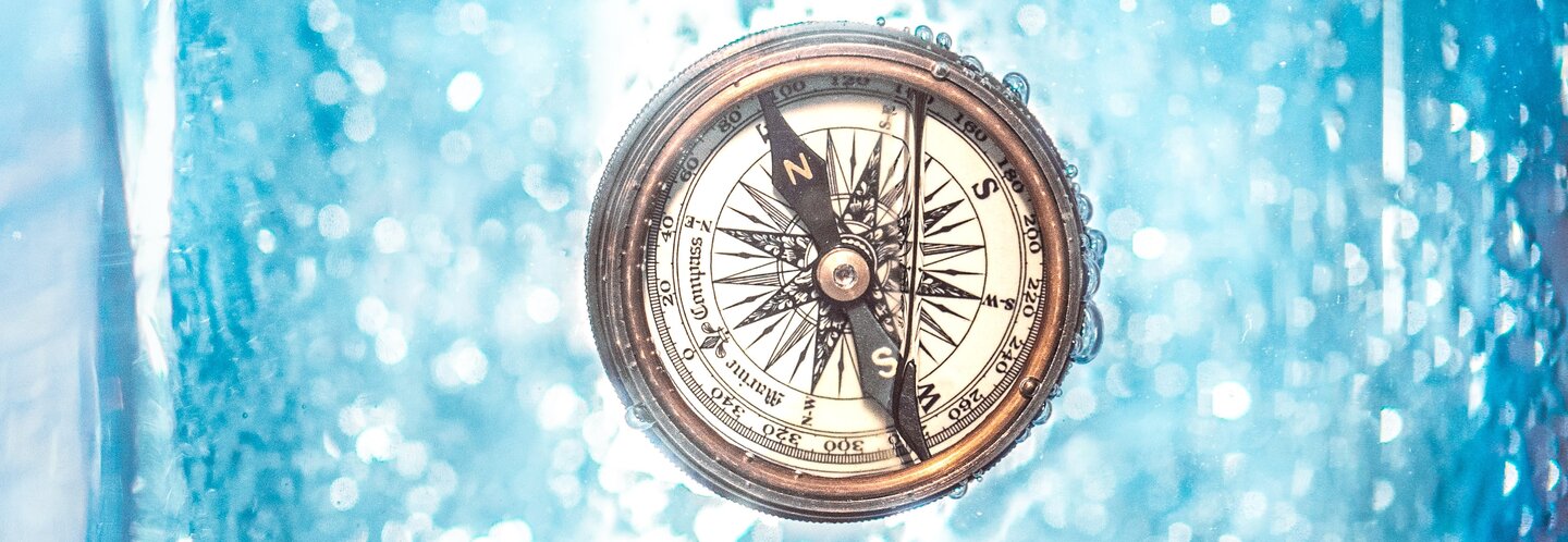 Compass in blue ice
